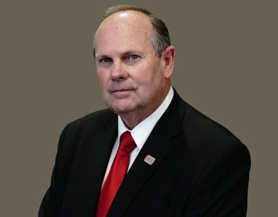 Dr. Robert J. Exley, President