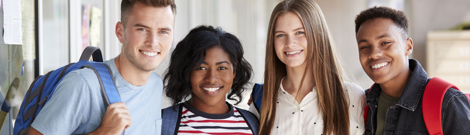 group of student outside laughing together