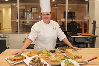 Culinary Arts Instructor showing food