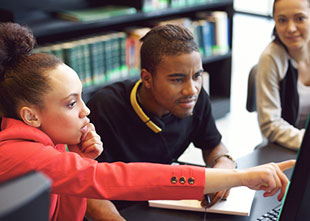 Students looking up information online