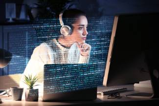 Woman analyzing computer data