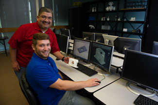 Student with instructor using CADD program
