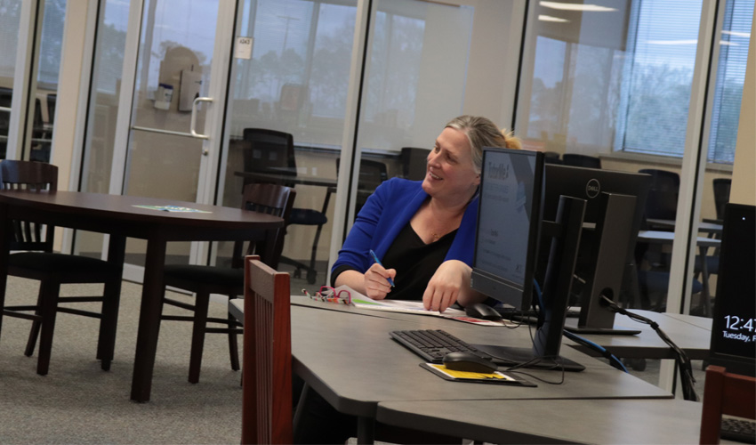 Natalie Freese, Director of Learning Commons enjoying Liz Sitta's speech.