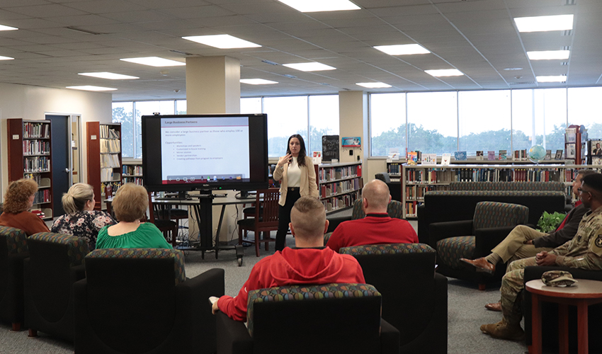 Sarah Currie, CEWD, giving a presentation