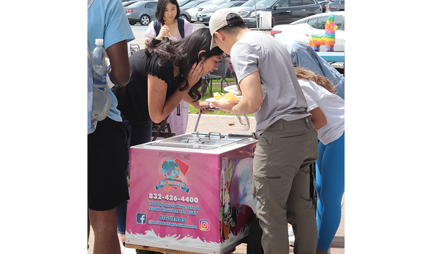 Students in line to get ice cream. 
