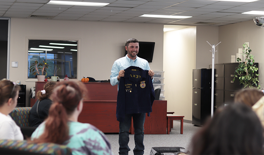 Tyler Froberg showing off a jacket.