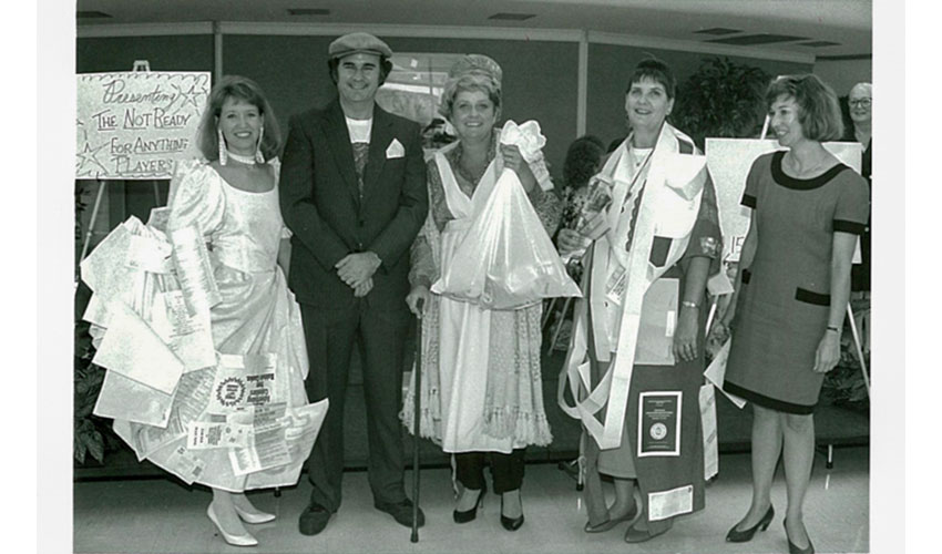 13 of 34 Four adults playing dress up.