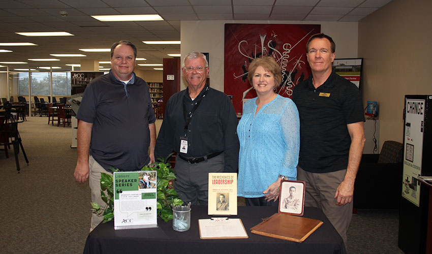 Picture of Don Jefferies with the Library staff.